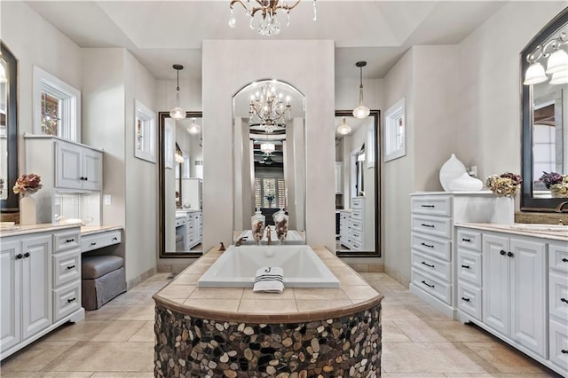 11110 W 146th Ter, Overland Park, KS 66221 - bathroom with a chandelier, vanity, a garden tub, and plenty of natural light