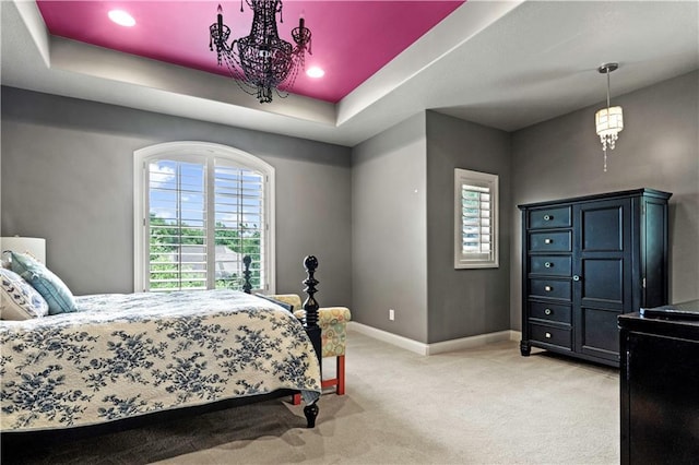 11110 W 146th Ter, Overland Park, KS 66221 - bedroom with light colored carpet and a tray ceiling