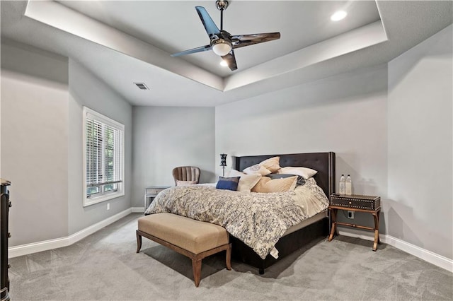 11110 W 146th Ter, Overland Park, KS 66221 - bedroom featuring a raised ceiling, carpet, a ceiling fan, and recessed lighting