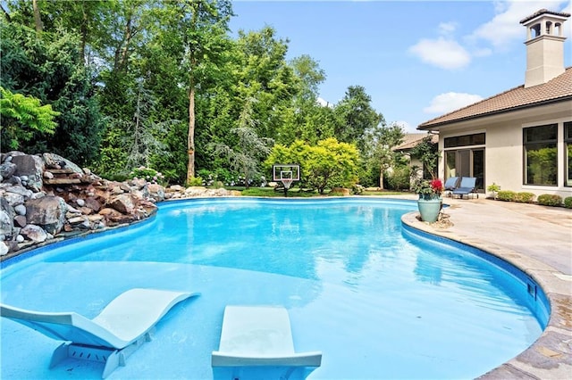 11110 W 146th Ter, Overland Park, KS 66221 - outdoor pool with a patio