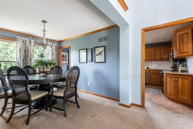 190 W Colleen Ct, Gardner, KS 66030 - dining space featuring a chandelier, light carpet, and crown molding