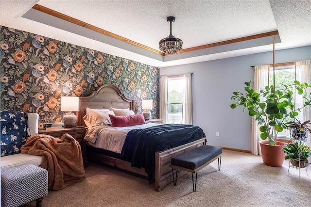 190 W Colleen Ct, Gardner, KS 66030 - bedroom with a tray ceiling, a textured ceiling, light carpet, ornamental molding, and wallpapered walls