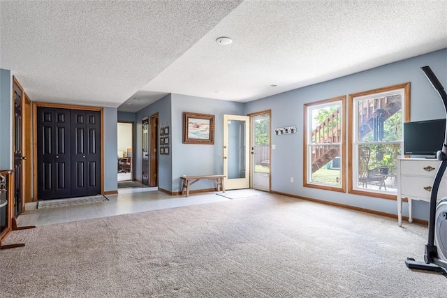 190 W Colleen Ct, Gardner, KS 66030 - entryway with a textured ceiling and carpet flooring