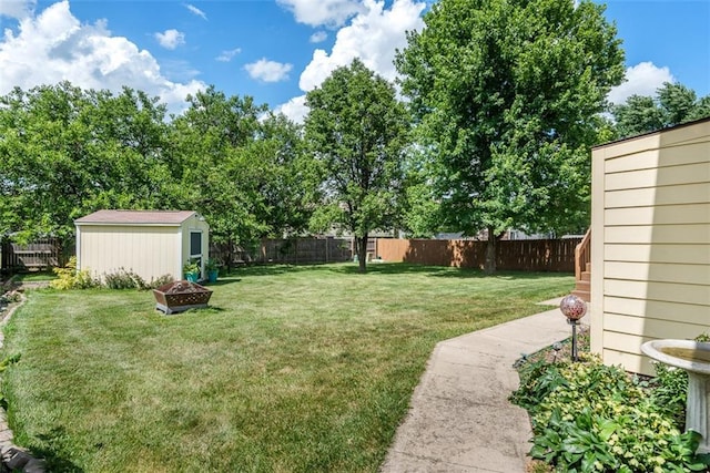 190 W Colleen Ct, Gardner, KS 66030 - fenced backyard featuring a storage shed and a fire pit
