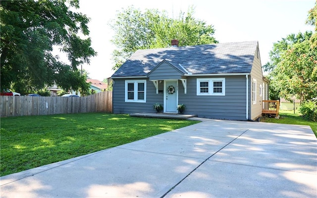 1034 E Lexington Ave, Independence, MO 64050 - bungalow-style home featuring a chimney