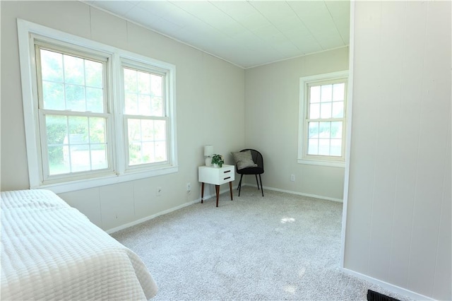 1034 E Lexington Ave, Independence, MO 64050 - carpeted bedroom with baseboards