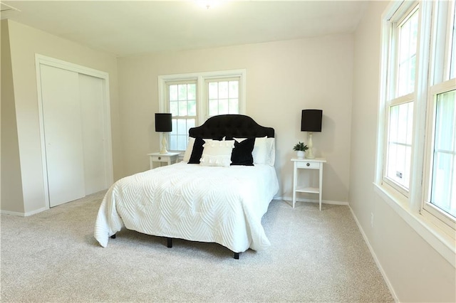 1034 E Lexington Ave, Independence, MO 64050 - carpeted bedroom with a closet and baseboards