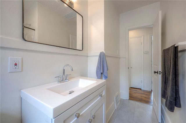 41 S 26th St, Kansas City, KS 66102 - bathroom with vanity and tile patterned flooring