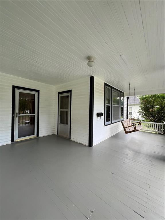 233 Main St, Osawatomie, KS 66064 - view of covered porch