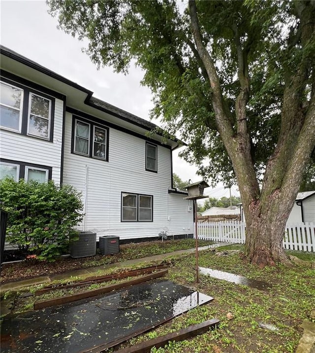 233 Main St, Osawatomie, KS 66064 - view of home's exterior featuring a central AC unit