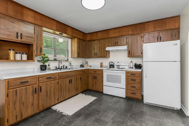 210 S 12th St, Leavenworth, KS 66048 - kitchen featuring white appliances, under cabinet range hood, light countertops, brown cabinetry, and open shelves