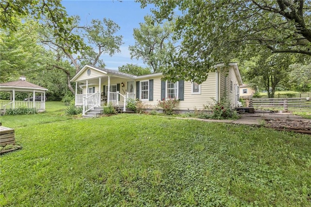 8036 Bellefontaine Ave, Kansas City, MO 64132 - view of front of house featuring a porch and a gazebo