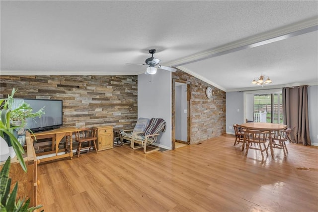 8036 Bellefontaine Ave, Kansas City, MO 64132 - dining space with crown molding, a textured ceiling, a chandelier, light wood finished floors, and ceiling fan