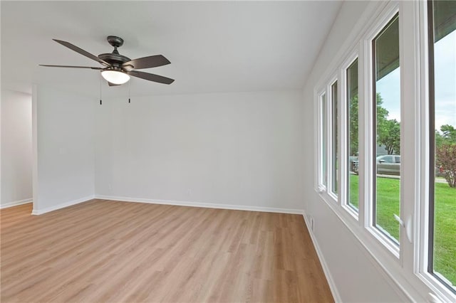 6600 W 93rd Ter, Overland Park, KS 66212 - empty room featuring light wood-type flooring and a ceiling fan
