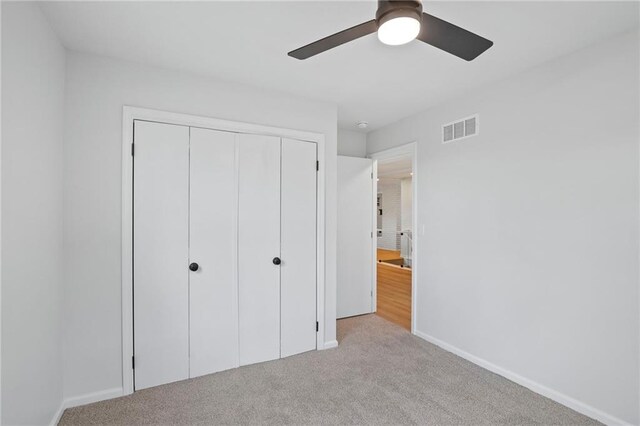 6600 W 93rd Ter, Overland Park, KS 66212 - unfurnished bedroom featuring a closet, carpet flooring, and a ceiling fan