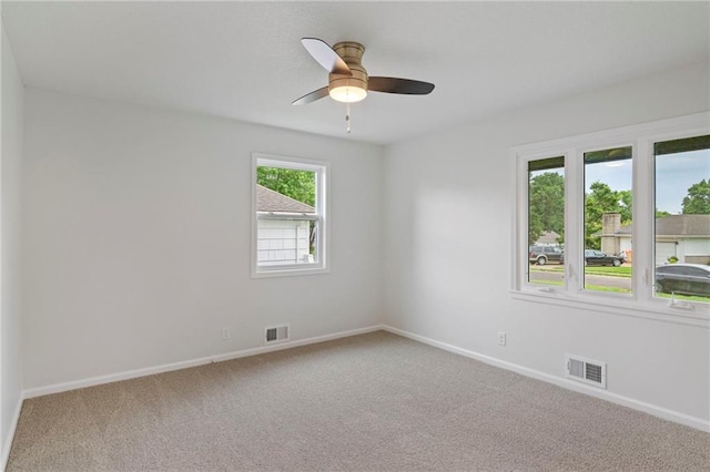 6600 W 93rd Ter, Overland Park, KS 66212 - carpeted spare room with baseboards and ceiling fan