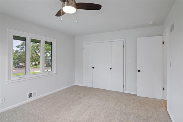 6600 W 93rd Ter, Overland Park, KS 66212 - unfurnished bedroom featuring carpet flooring, a closet, and ceiling fan