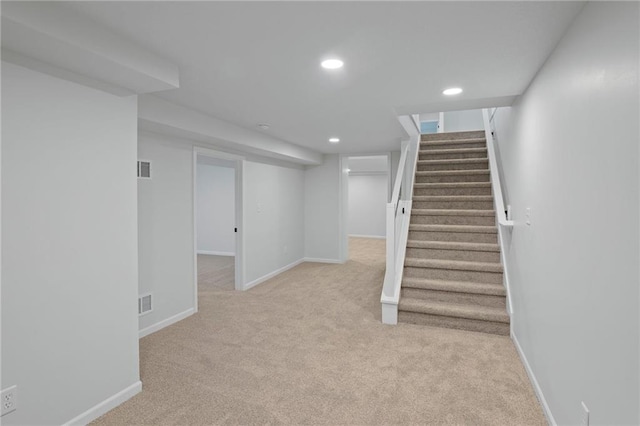 6600 W 93rd Ter, Overland Park, KS 66212 - finished below grade area featuring light colored carpet, stairs, and recessed lighting