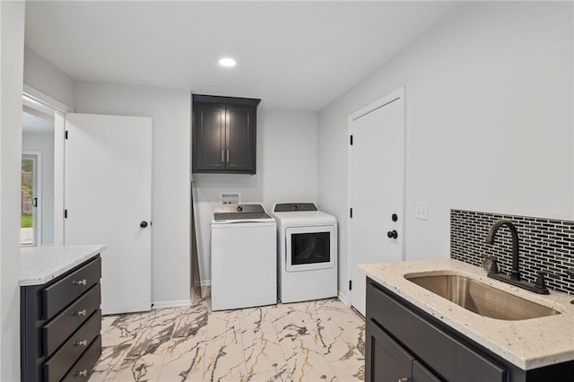 6600 W 93rd Ter, Overland Park, KS 66212 - washroom featuring independent washer and dryer, cabinet space, light marble finish floors, and recessed lighting