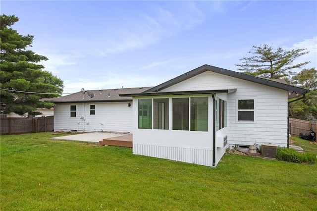 6600 W 93rd Ter, Overland Park, KS 66212 - rear view of property featuring a patio and a sunroom