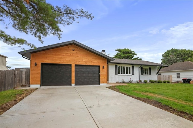 6600 W 93rd Ter, Overland Park, KS 66212 - view of front facade with an attached garage, concrete driveway, and brick siding