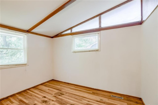 4400 N Brighton Ave, Kansas City, MO 64117 - unfurnished room with light wood finished floors