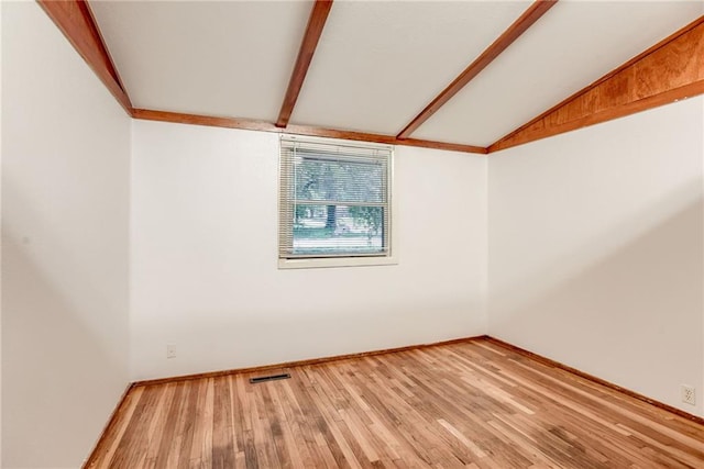 4400 N Brighton Ave, Kansas City, MO 64117 - spare room with light wood finished floors and baseboards