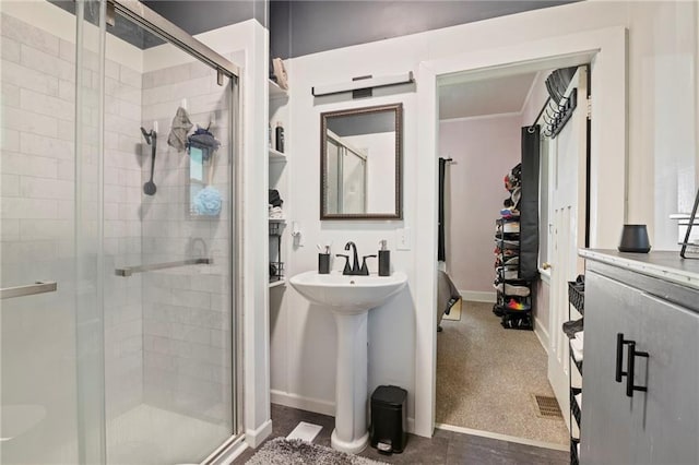 508 S Elm St, Ottawa, KS 66067 - bathroom featuring a shower stall and crown molding