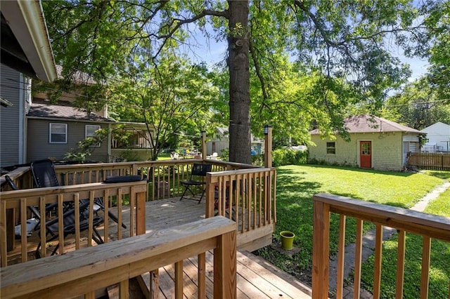 508 S Elm St, Ottawa, KS 66067 - wooden terrace featuring a lawn