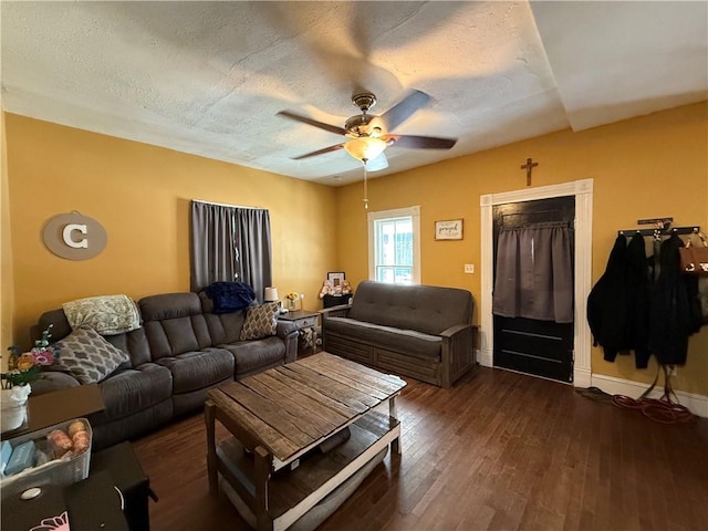 310 W 23rd St, Higginsville, MO 64037 - living room with a ceiling fan, wood-type flooring, and a textured ceiling