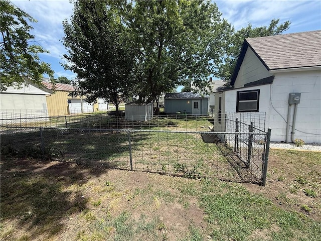 310 W 23rd St, Higginsville, MO 64037 - view of yard with a storage unit