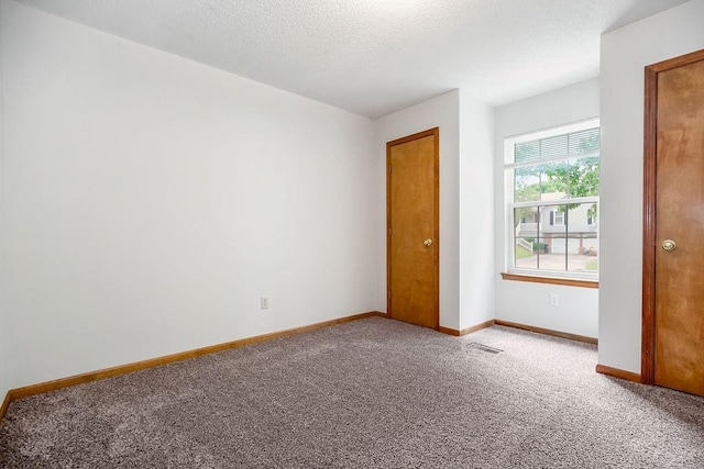 733 NE Colleen Dr, Lees Summit, MO 64086 - carpeted spare room with baseboards