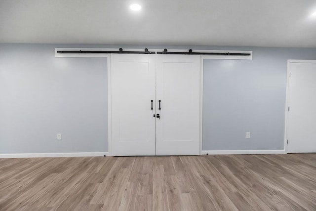 733 NE Colleen Dr, Lees Summit, MO 64086 - basement featuring light wood-type flooring and baseboards