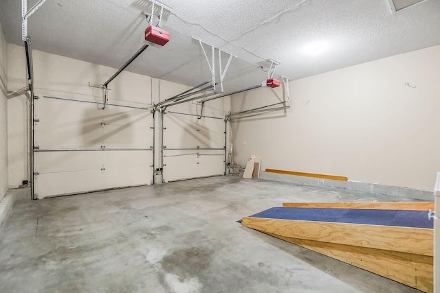 733 NE Colleen Dr, Lees Summit, MO 64086 - garage featuring a garage door opener