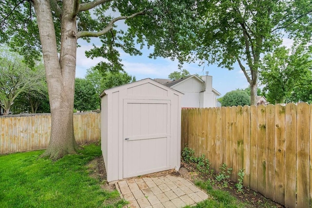 733 NE Colleen Dr, Lees Summit, MO 64086 - view of shed featuring a fenced backyard