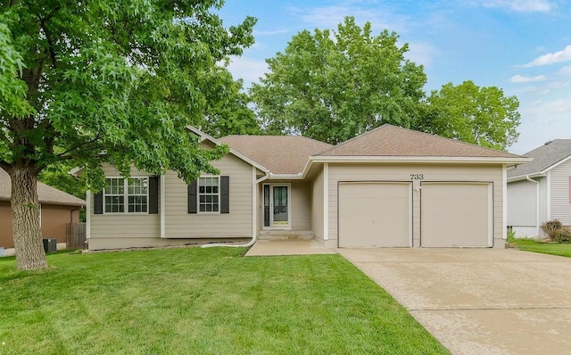 733 NE Colleen Dr, Lees Summit, MO 64086 - single story home with a garage, driveway, and a front lawn