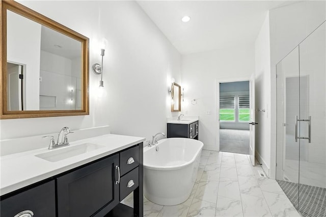 13300 W 174th Pl, Overland Park, KS 66221 - bathroom featuring two vanities, a shower stall, marble finish floors, a soaking tub, and recessed lighting