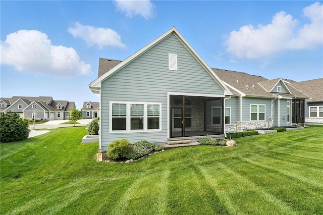 13300 W 174th Pl, Overland Park, KS 66221 - rear view of property with a yard, a sunroom, and stone siding