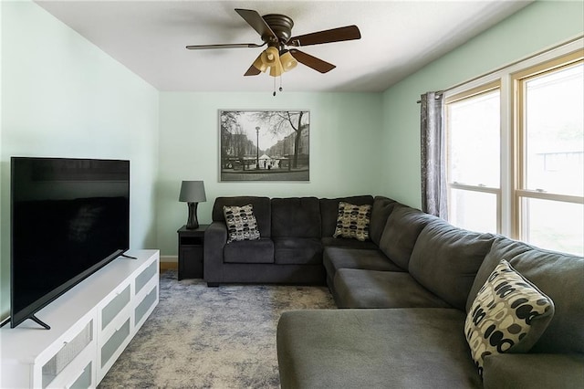 12205 W 67th Ter, Shawnee, KS 66216 - carpeted living room with a ceiling fan