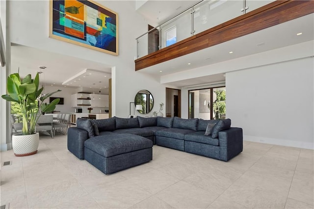 10712 W 165th St, Overland Park, KS 66221 - tiled living area featuring a high ceiling