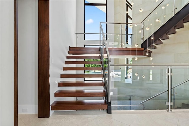 10712 W 165th St, Overland Park, KS 66221 - staircase with tile patterned flooring