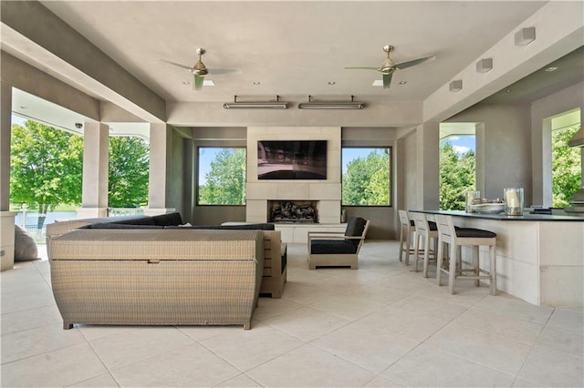 10712 W 165th St, Overland Park, KS 66221 - view of patio featuring an outdoor living space with a fireplace, an outdoor bar, and a ceiling fan