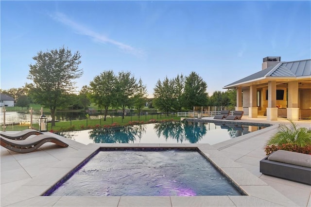 10712 W 165th St, Overland Park, KS 66221 - view of swimming pool featuring an in-ground hot tub and a patio area