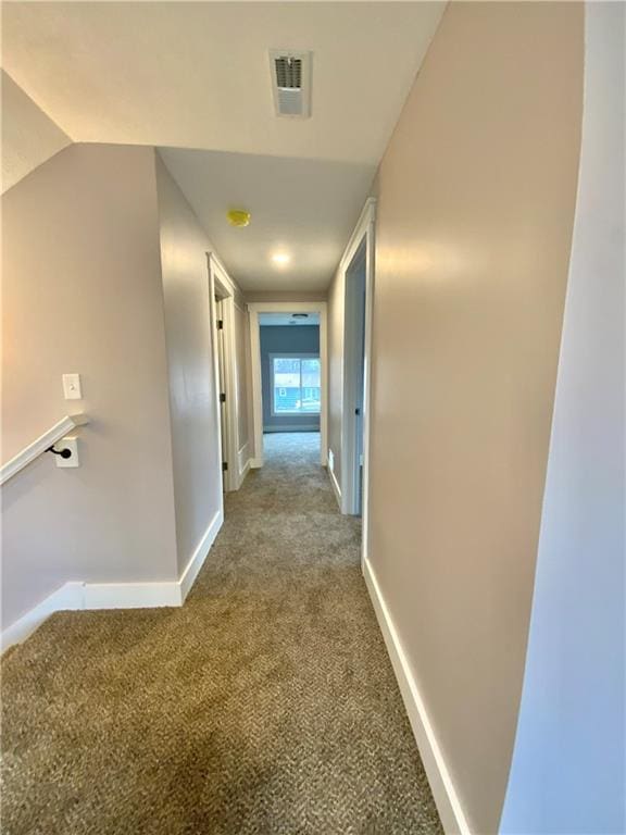 3046 N 27th St, Kansas City, KS 66104 - hallway with carpet flooring and vaulted ceiling