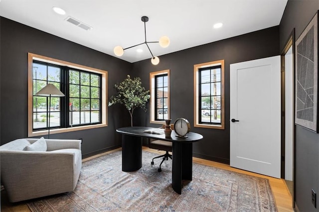 529 E 19th St, Kansas City, MO 64108 - office featuring plenty of natural light, wood finished floors, and recessed lighting