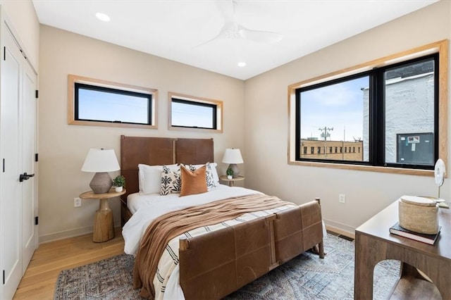 529 E 19th St, Kansas City, MO 64108 - bedroom featuring wood finished floors, recessed lighting, and ceiling fan