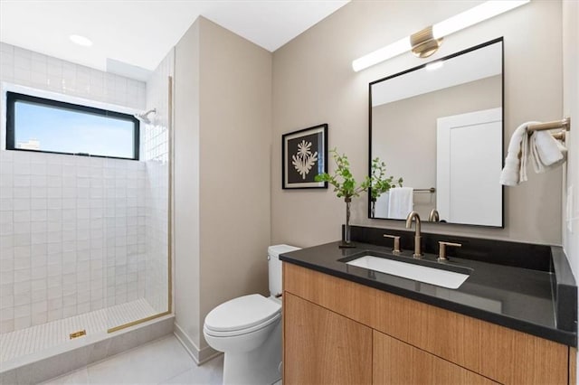 529 E 19th St, Kansas City, MO 64108 - full bath featuring vanity, a tile shower, and tile patterned floors