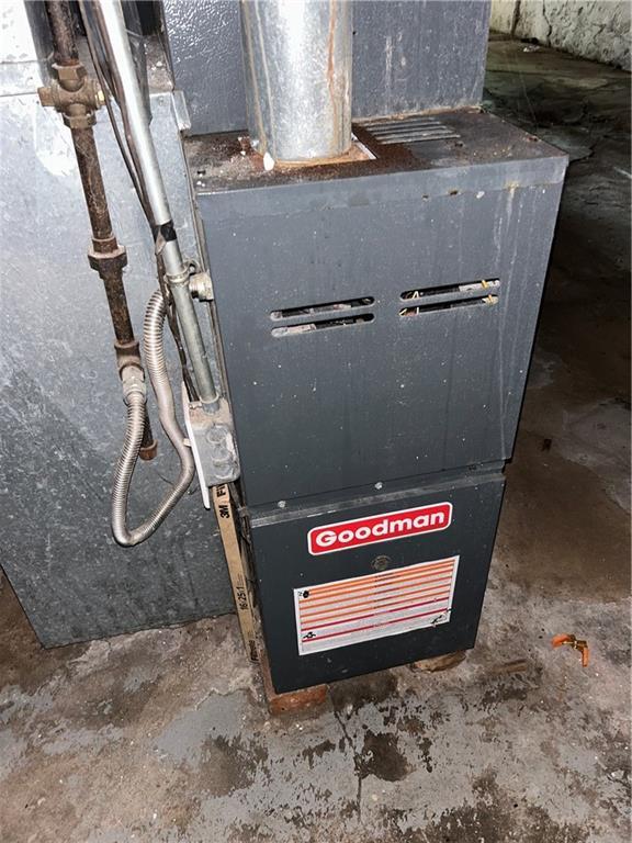 907 S Cedar Ave, Independence, MO 64052 - basement view of heating unit