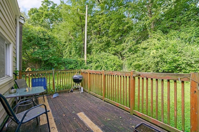 255 N Michigan St Unit 90, Lawrence, KS 66044 - wooden terrace with a grill