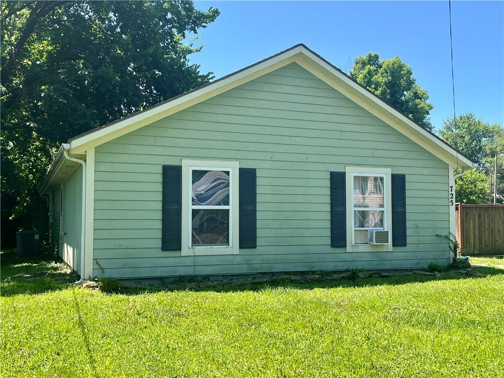 725 Pacific St, Osawatomie, KS 66064 - view of home's exterior with a cooling unit and cooling unit